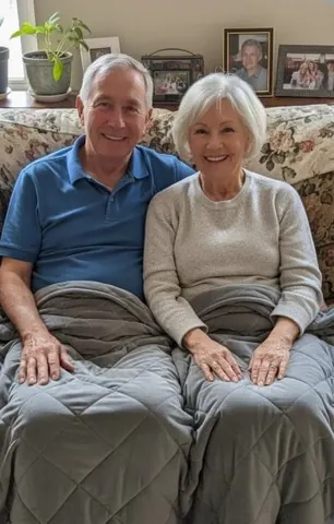 Couple sharing a Velin weighted blanket